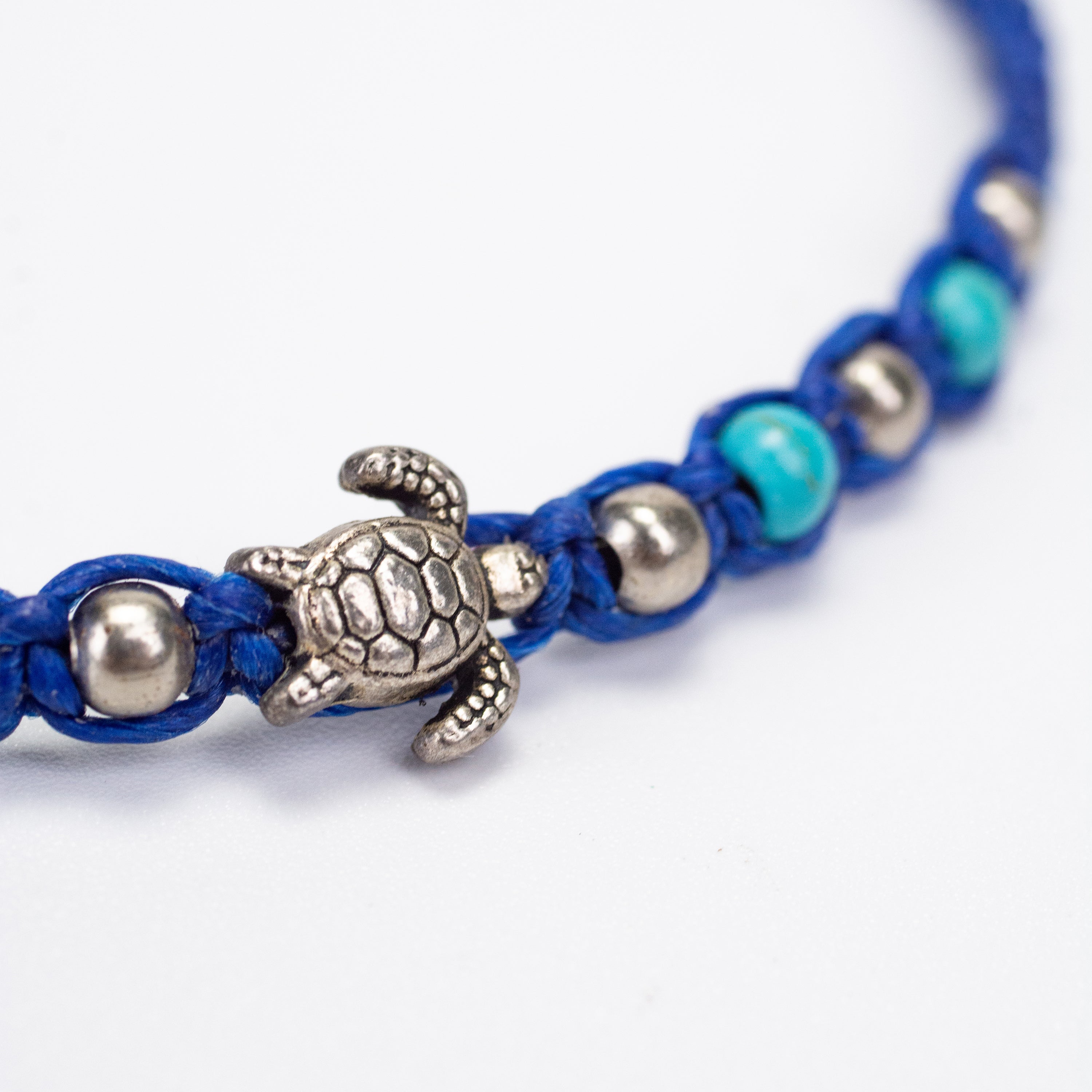 Turquoise and Silver Beads Bracelet with Turtle Silver Charm in Blue