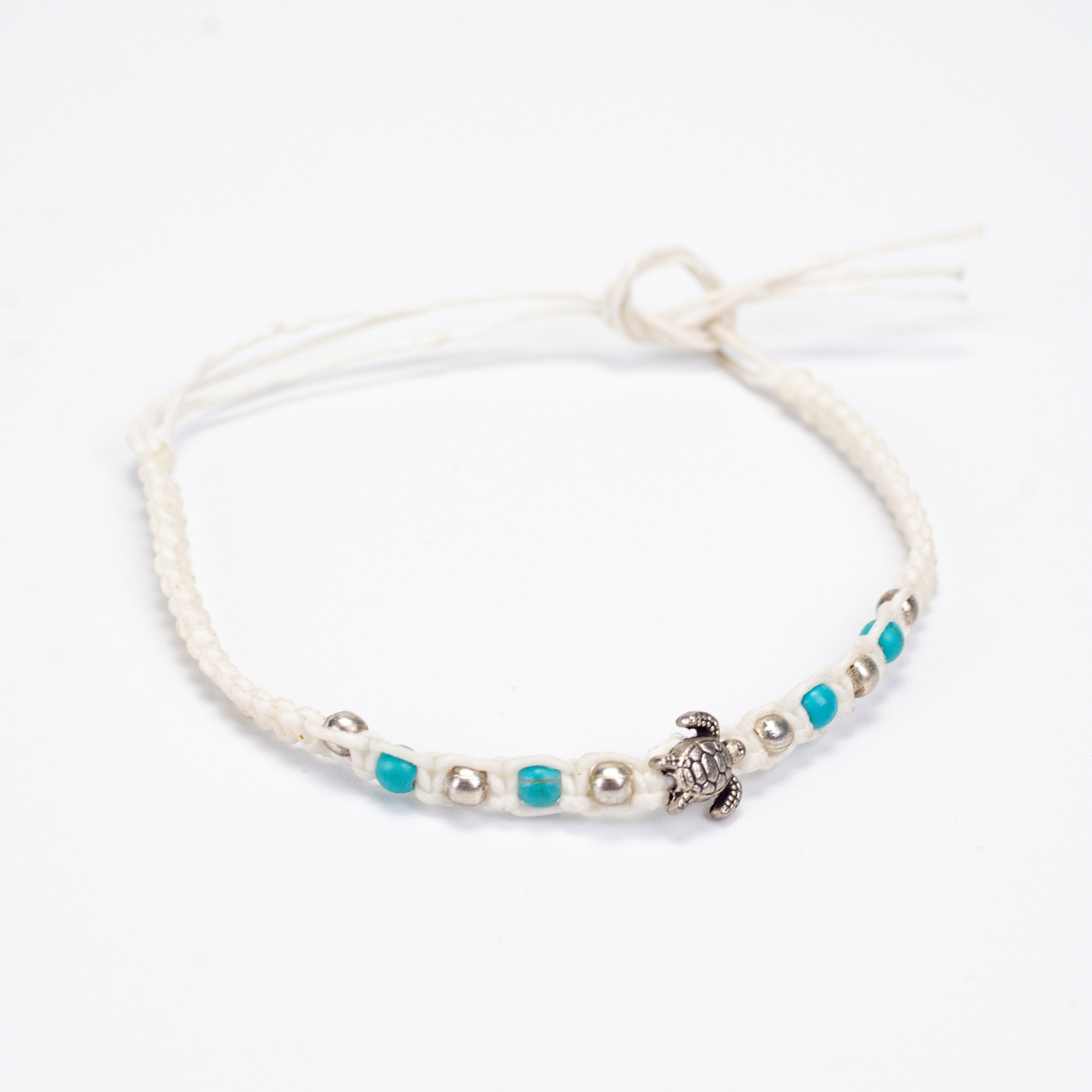 Turquoise and Silver Beads Bracelet with Turtle Silver Charm in White