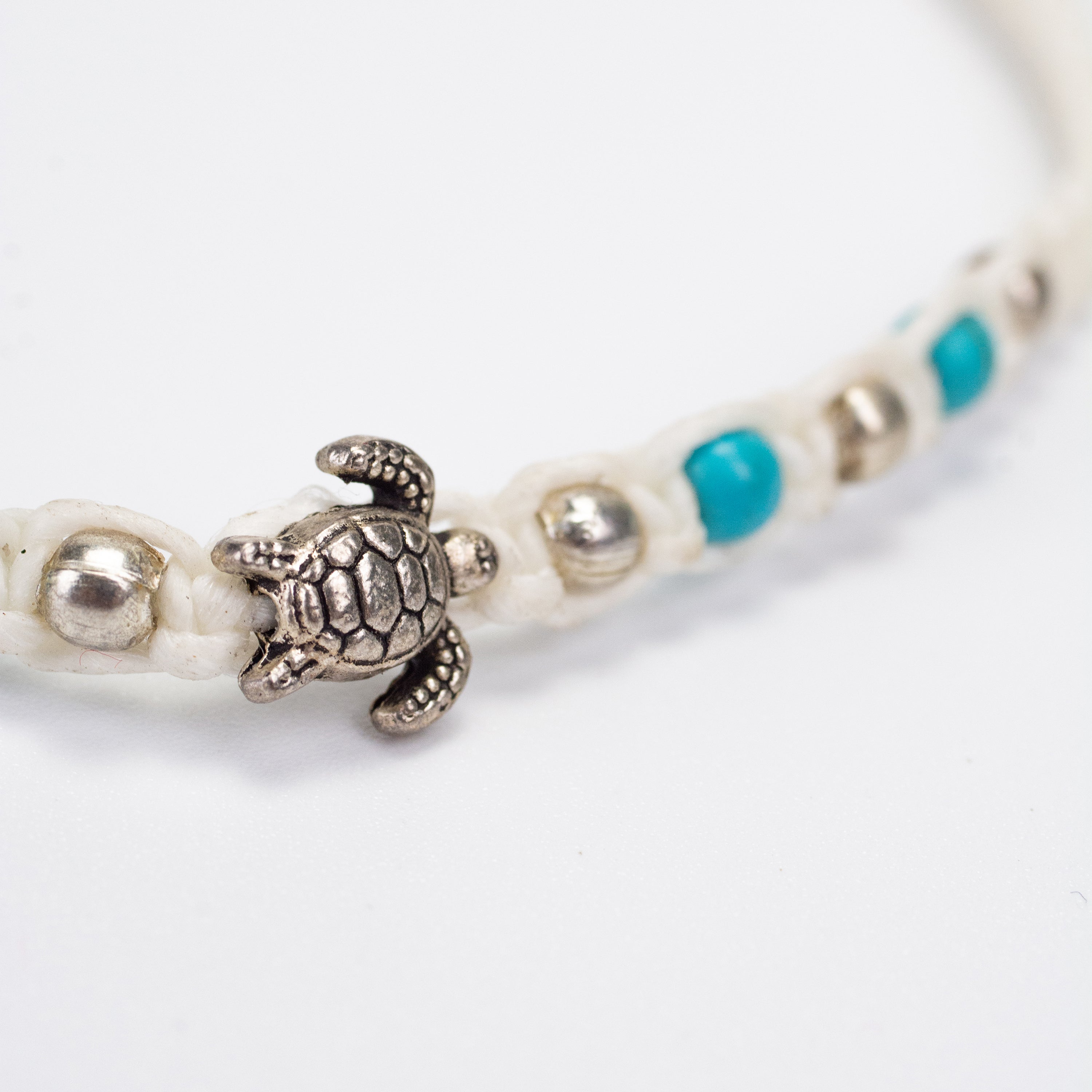 Turquoise and Silver Beads Bracelet with Turtle Silver Charm in White