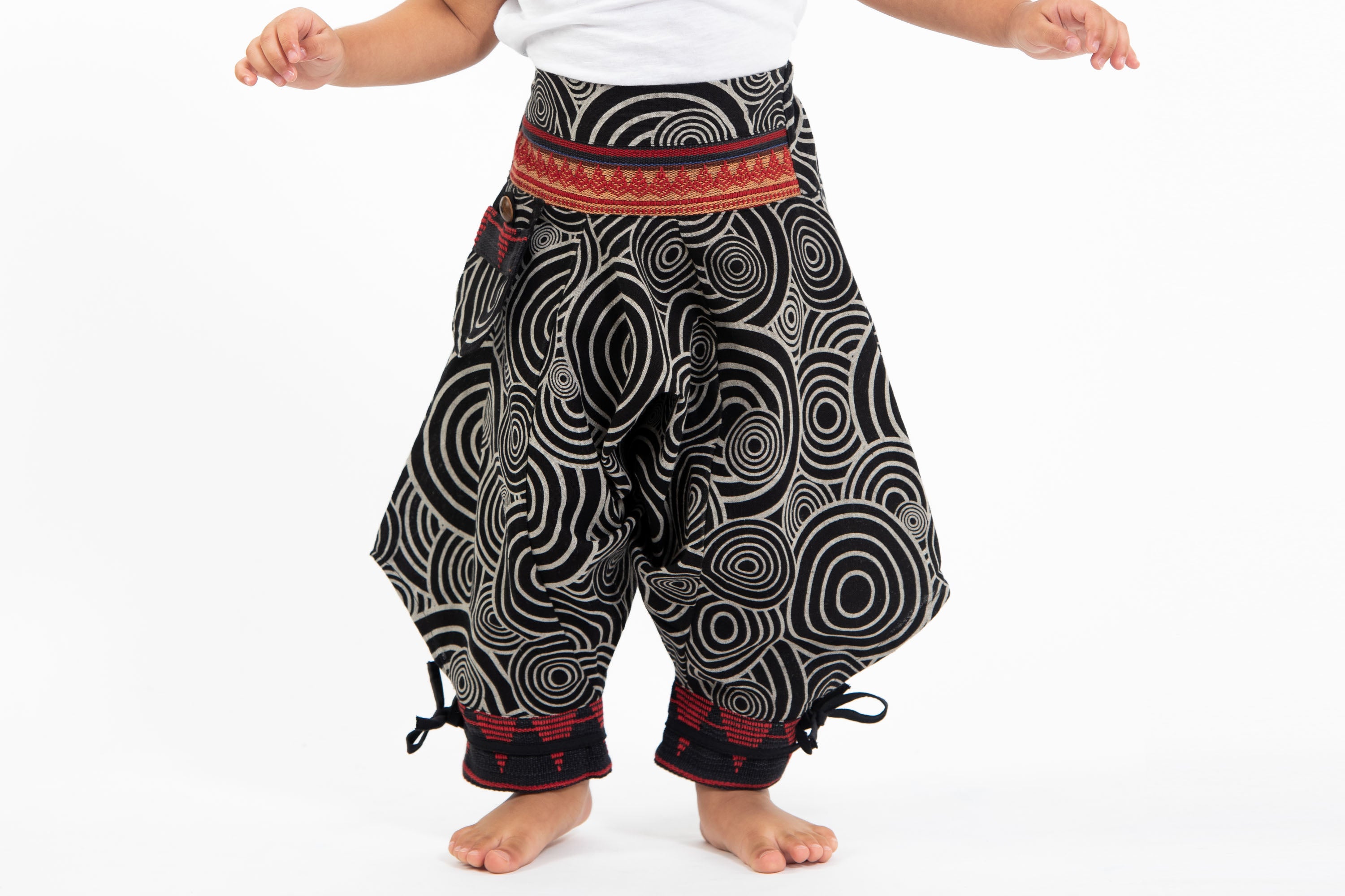 Swirls Prints Thai Hill Tribe Fabric Kids Harem Pants with Ankle Straps in Black